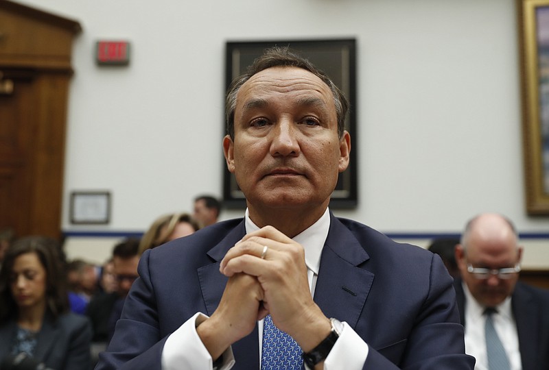 
              FILE - In this Tuesday, May 2, 2017, file photo, United Airlines CEO Oscar Munoz prepares to testify on Capitol Hill in Washington, before a House Transportation Committee oversight hearing. At the United Continental Holdings Inc. annual meeting, Wednesday, May 24, 2017, United Airlines investors will get their chance to ask Munoz about the violent removal of a man from a plane and other recent incidents. Shareholders also will vote on whether to re-elect board members, and get their say on executive pay. (AP Photo/Pablo Martinez Monsivais, File)
            