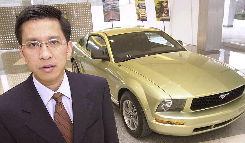 
              FILE - In this Feb. 20, 2004 file photo,  Hau Thai-Tang stands next to a Ford Mustang at the Ford's headquarters in Dearborn, Mich. A person briefed on the matter says Ford Motor Co. will announce a management shakeup Thursday, May 25, 2017 that includes replacement of its global product development chief. The person says Vice President of Global Purchasing Hau Thai-Tang will take over product development from Raj Nair. The person says Nair will stay on in another unidentified key management role. He’s also Ford’s chief technical officer. (AP Photo/Todd VanSickle)
            