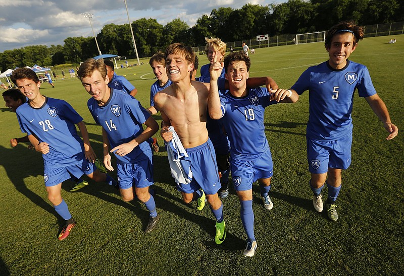 McCallie celebrates their TSSAA Division II-AA state soccer tournament championship win over MBA on Thursday, May 25, 2017, in Murfreesboro, Tenn. McCallie won 3-2 to seal the championship.
