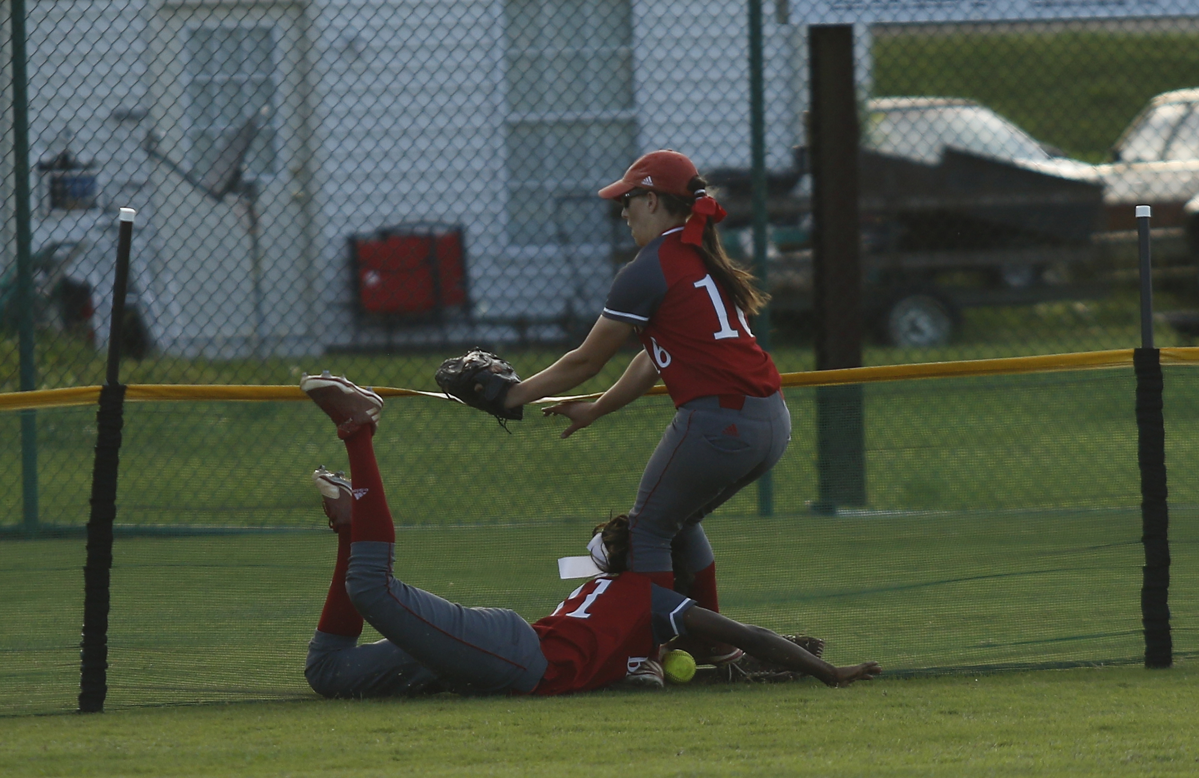 Baylor outfielders Ashton Brazzell, right, and Makayla Packer collide on a play during their TSSAA Division II-AA state softball championship game 2 against GPS on Friday, May 26, 2017, in Murfreesboro, Tenn.