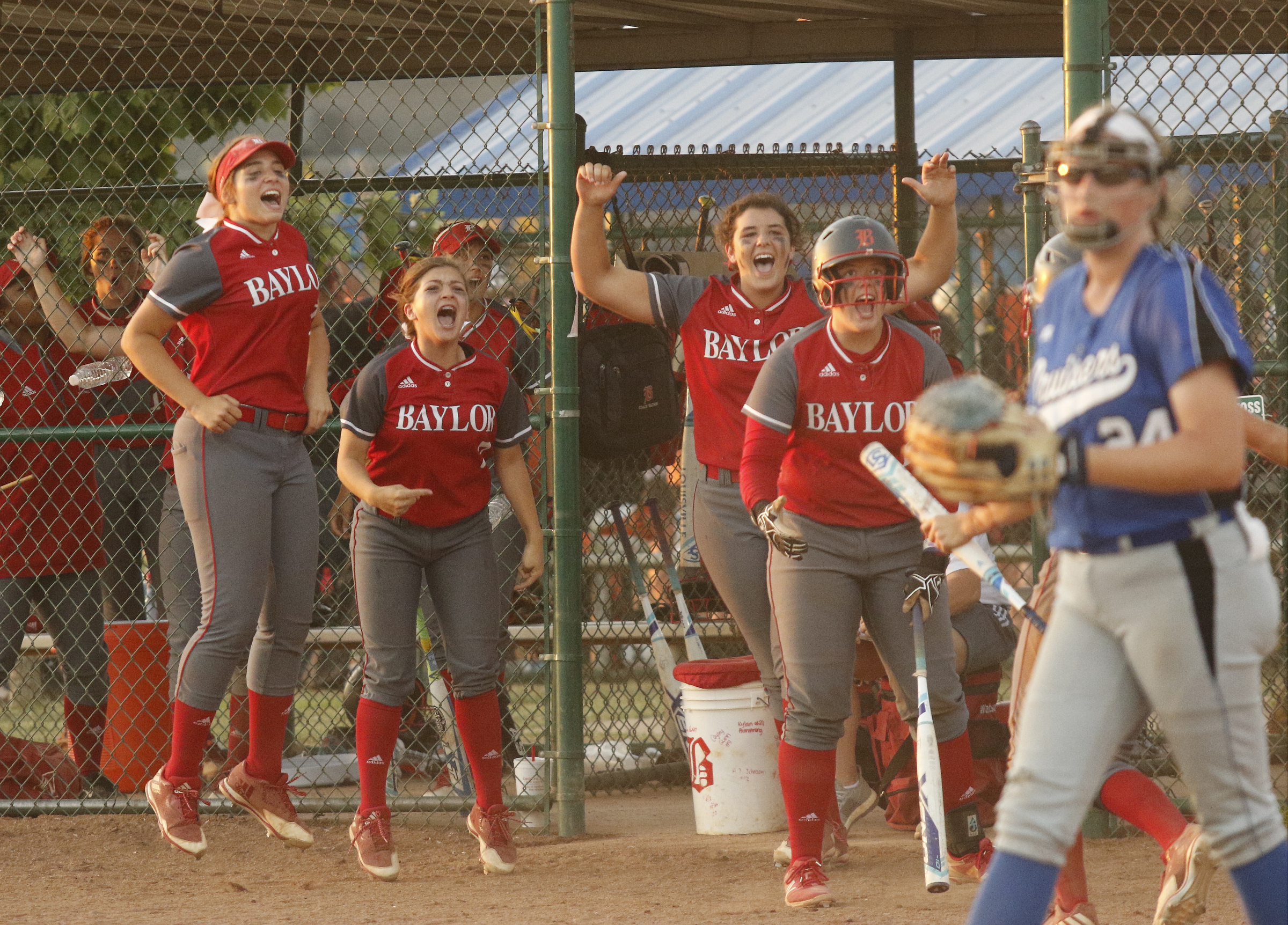 Baylor players celebrate a run during their TSSAA Division II-AA state softball championship game 2 against GPS on Friday, May 26, 2017, in Murfreesboro, Tenn.