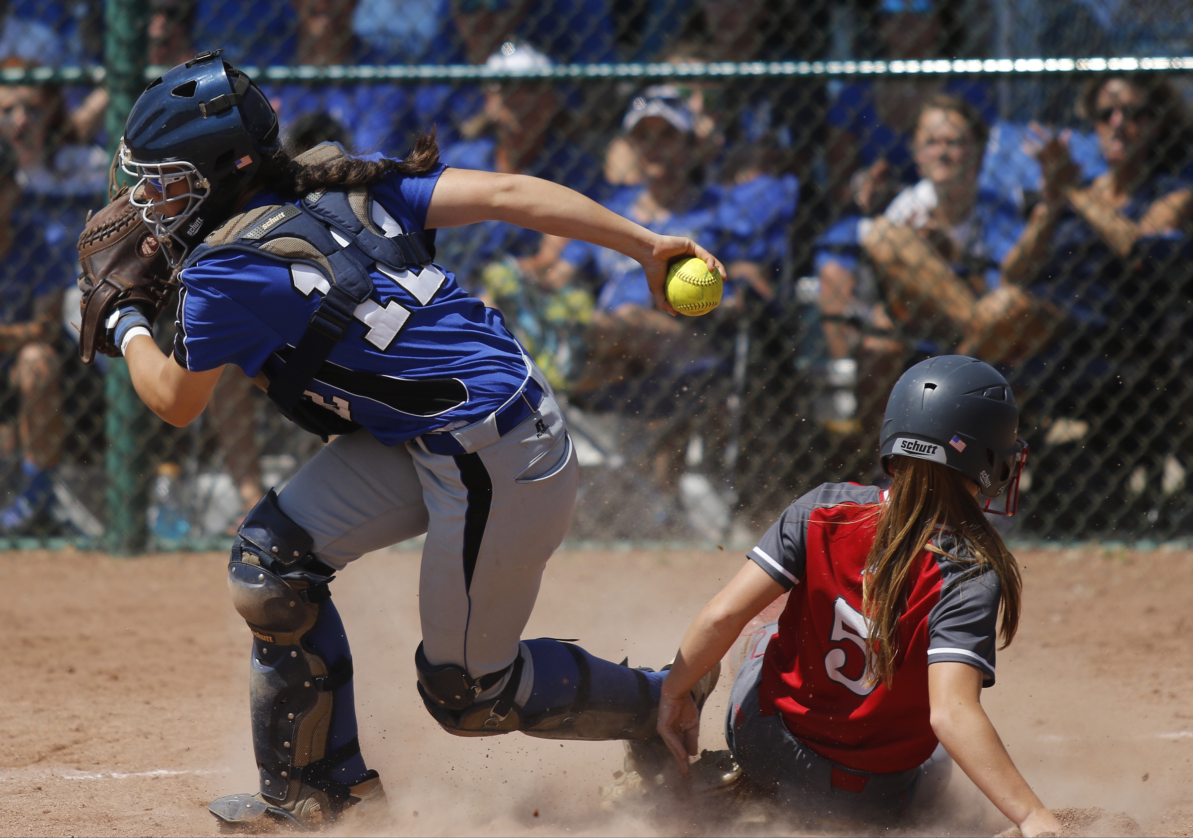 GPS catcher Kaitlyn Songer forces Baylor runner Carmen Ross out at home during their TSSAA Division II-AA state softball championship game 1 on Friday, May 26, 2017, in Murfreesboro, Tenn.