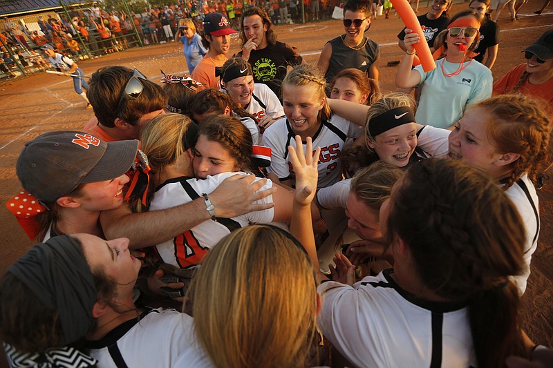 Meigs County softball players celebrate their TSSAA Class A championship victory over Forrest on Friday in Murfreesboro.