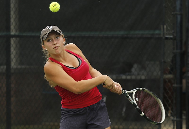 Drew Hawkins returns the ball during the 2017 TSSAA Division II-AA tennis girls' singles championship match against Baylor teammate Landie McBrayer in Murfreesboro, Tenn. Hawkins took the state title that day, and she added three titles this weekend at the Chattanooga City Championship tournament.