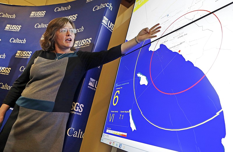 
              FILE - This Jan. 28, 2013 file photo, seismologist Dr. Lucy Jones, describes how an early warning system would provide advance warning of an earthquake, at a news conference at the California Institute of Technology in Pasadena, Calif. President Donald Trump's budget proposal would cut federal funding for an earthquake early warning system for California, Oregon and Washington state, a development that seismology experts and some local leaders say would be the end of the project. (AP Photo/Reed Saxon, File)
            