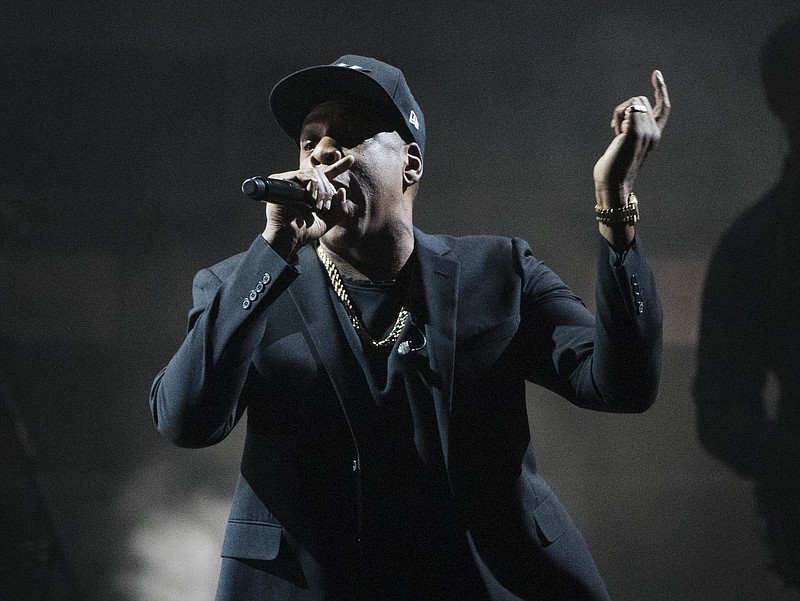 
              FILE- In this Nov. 4, 2016, file photo, Jay Z performs during a campaign rally for Democratic presidential candidate Hillary Clinton in Cleveland. Jay Z’s Tidal streaming service has lost its third CEO in two years. Tidal said Friday, May 26, 2017, that Jeffrey Toig has left the company, which launched in 2015. Toig joined in Tidal in Jan. 2016. (AP Photo/Matt Rourke, File)
            