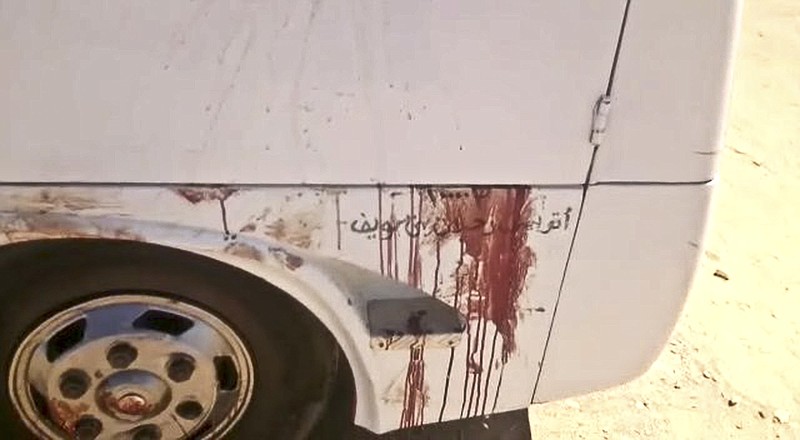 
              This image released by the Minya governorate media office shows blood after gunmen stormed a bus in Minya, Egypt, Friday, May 26, 2017. Egyptian officials say dozens of people were killed and wounded in an attack by masked militants on a bus carrying Coptic Christians, including children, south of Cairo.  (Minya Governorate Media office via AP)
            