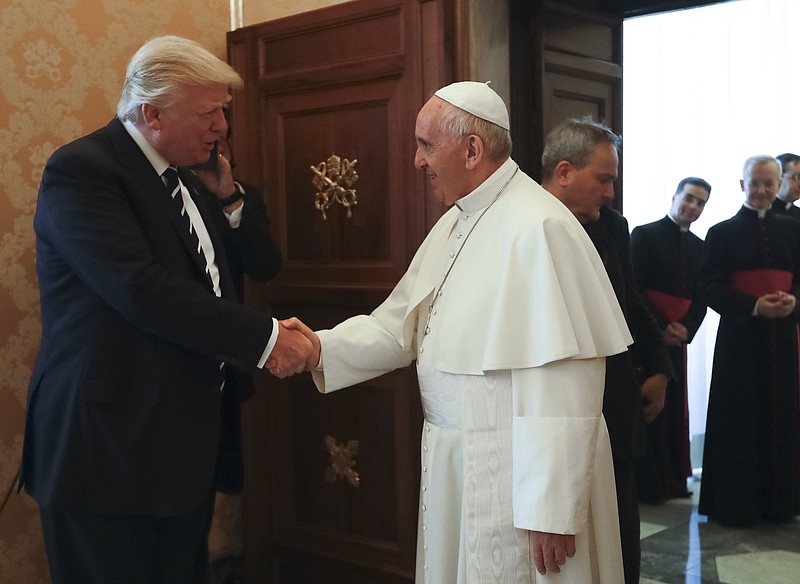 
              In this May 24, 2017, photo, Pope Francis meets with President Donald Trump at the Vatican. When Trump met Pope Francis, the U.S. leader renewed a commitment to fighting global famine and proudly announced a new multimillion-dollar American aid contribution to four African nations in crisis. Left unsaid by the president or the White House: His proposal to slash such funds by more than 40 percent in the next fiscal year. (AP Photo/Alessandra Tarantino, Pool)
            