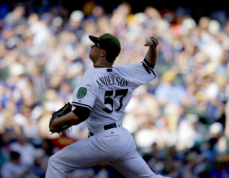 
              Milwaukee Brewers starting pitcher Chase Anderson throws to the Arizona Diamondbacks during the sixth inning of a baseball game Saturday, May 27, 2017, in Milwaukee. (AP Photo/Jeffrey Phelps)
            