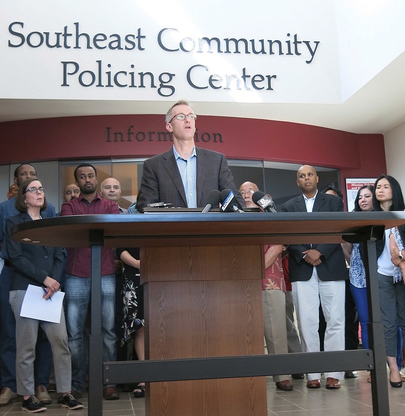 
              Portland Mayor Ted Wheeler speak at a news conference after a man fatally stabbed two men Friday on a light-rail train when they tried to stop him from yelling anti-Muslim slurs at two young women, one of whom was wearing a hijab, in Portland, Ore., Saturday, May 27, 2017. Jeremy Joseph Christian, 35, was booked on suspicion of aggravated murder and attempted murder in the attack and will make a first court appearance Tuesday. (AP Photo/Gillian Flaccus)
            