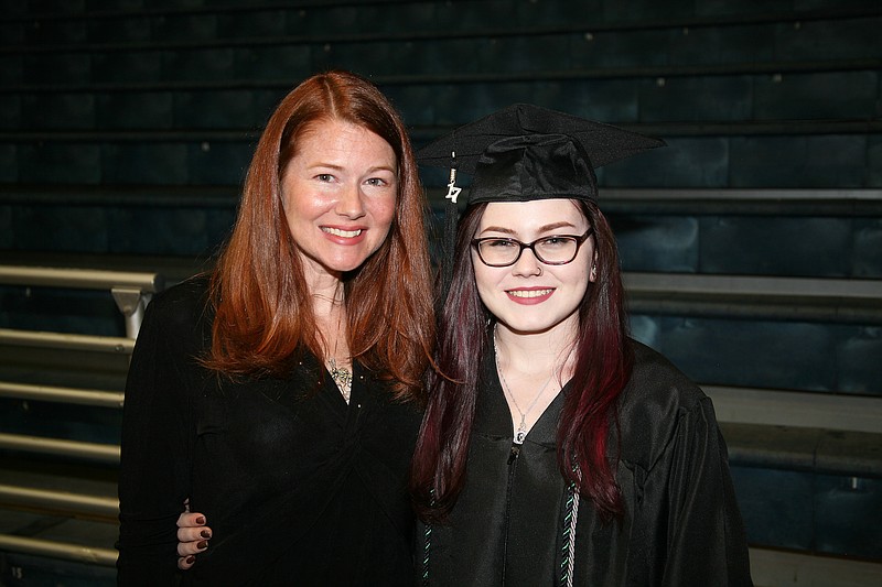 Miette Craig, right, and her mother, Bre LaMountain, pose after Craig received her associate degree in business management from Georgia Northwestern Technical College.