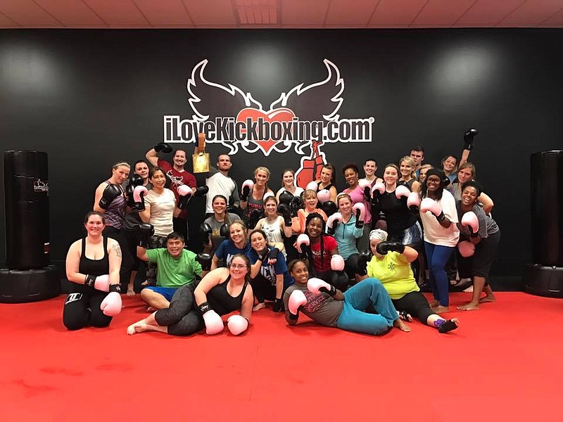 Kickboxers pose after a workout at iLoveKickboxing. (Contributed photo)