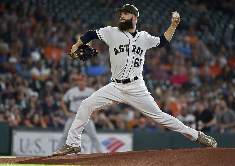 
              Houston Astros starting pitcher Dallas Keuchel delivers during the first inning of a baseball game against the Baltimore Orioles, Saturday, May 27, 2017, in Houston. (AP Photo/Eric Christian Smith)
            