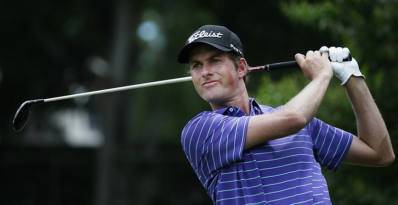 
              Webb Simpson watches his tee shot on the eighth hole during the third round of the Dean & DeLuca Invitational golf tournament at Colonial Country Club in Fort Worth, Texas, Saturday, May 27, 2017. (AP Photo/LM Otero)
            