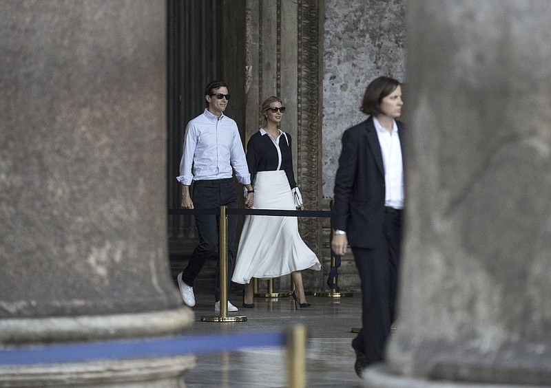 
              US President Donald Trump's assistant and daughter Ivanka Trump holds hands with her husband White House senior advisor Jared Kushner as they leave the Pantheon following their private visit, in Rome, Wednesday, May 24, 2017. (Massimo Percossi/ANSA via AP)
            