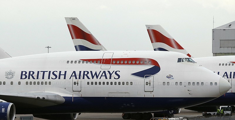 
              FILE - In this Tuesday, Jan. 10, 2017 file photo, British Airways planes are parked at Heathrow Airport during a 48hr cabin crew strike in London. Air travelers faced delays Saturday, May 27, 2017 because of a worldwide computer systems failure at British Airways, the airline said. BA apologized in a statement for what it called an "IT systems outage" and said it was working to resolve the problem. It said in a tweet that Saturday's problem is global.????????(AP Photo/Frank Augstein, file)
            