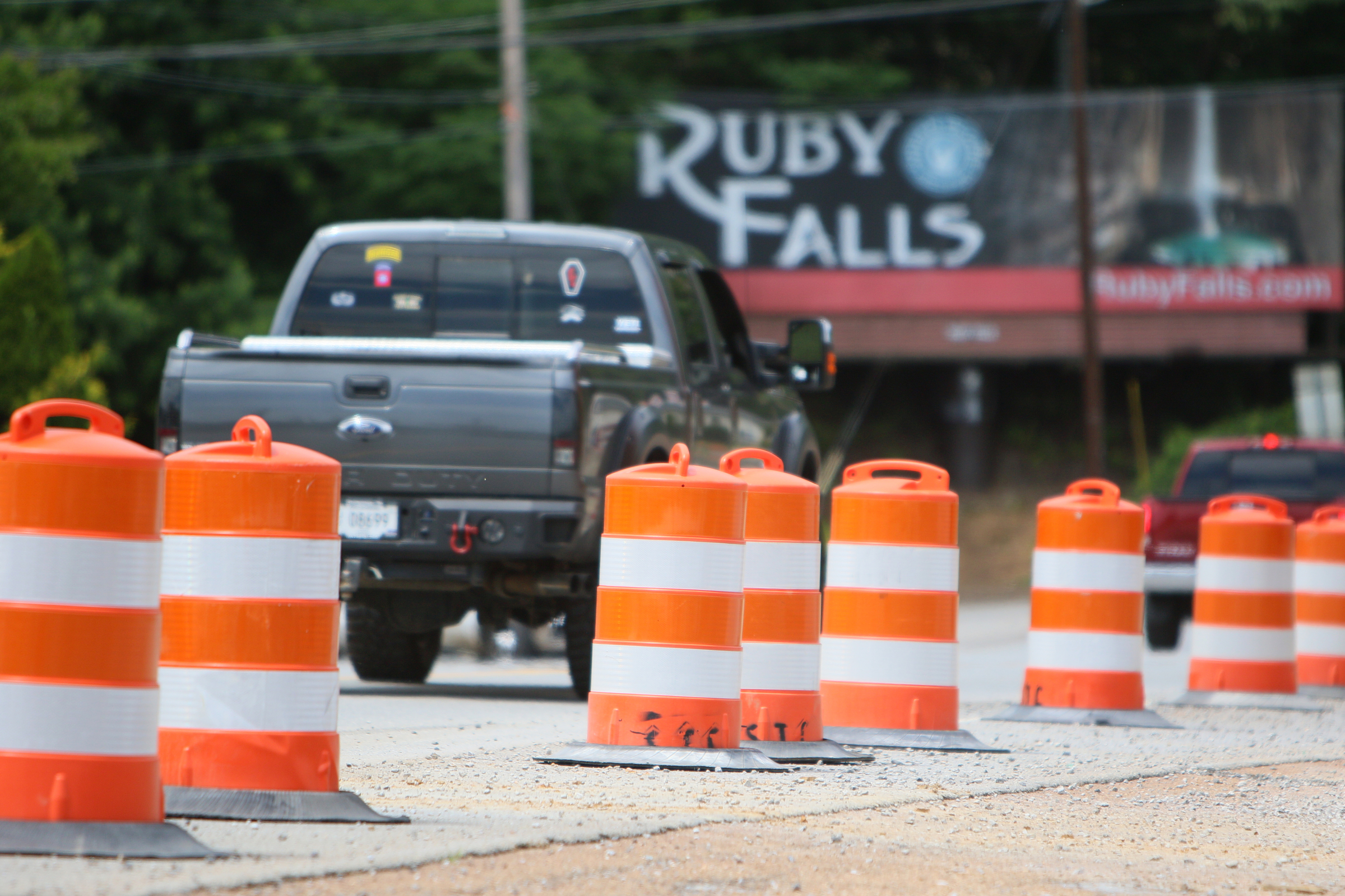 Construction barrels have been put up along Broad Street in Chattanooga, Tenn., blocking portions of St. Elmo Avenue Friday, May 26, 2017, that are part of an excavation project getting started in the area. The project is expected to continue through August.