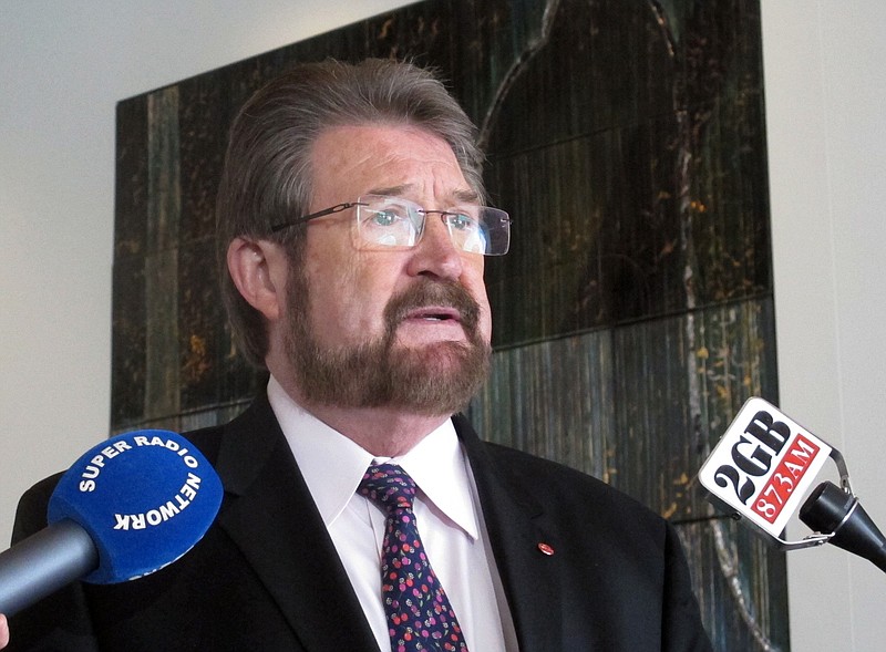 Australian independent Sen. Derryn Hinch holds a press conference in Parliament House in Canberra, Australia Tuesday, May 30, 2017. Hinch welcomes government support for legislation that he helped draft which would ban convicted pedophiles from traveling overseas in what the government says is a world-first move to protect vulnerable children in Southeast Asia from exploitation. (AP Photo/Rod McGuirk)