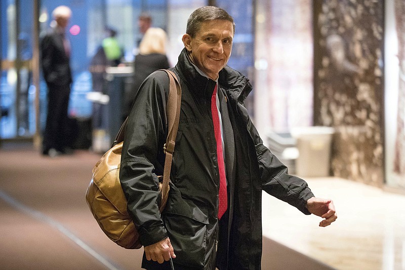 In this Jan. 3, 2017, file photo, Michael Flynn, then - President-elect Donald Trump's nominee for National Security Adviser arrives at Trump Tower in New York. Flynn will provide some documents to the Senate intelligence committee as part of its probe into Russia's meddling in the 2016 election. A person close to Flynn says that he will be turning over documents related to two of his businesses as well as some personal documents that the committee requested in May 2017. The person says that Flynn plans to produce documents by next week. (AP Photo/Andrew Harnik, File)