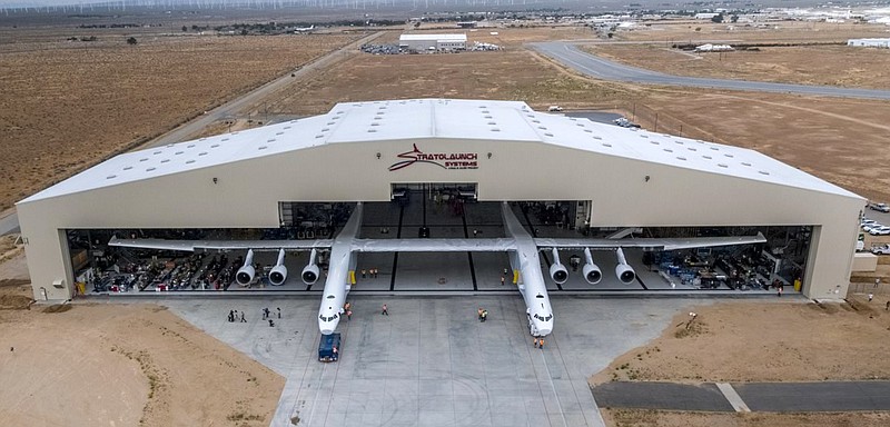 
              In this May 31, 2017 photo provided by Stratolaunch Systems Corp., the newly built Stratolaunch aircraft is moved out of its hangar for the first time in Mojave, Calif. The aircraft will undergo ground tests in preparation for flights in which the aircraft will launch rockets from high altitude. (Stratolaunch Systems Corp. via AP)
            