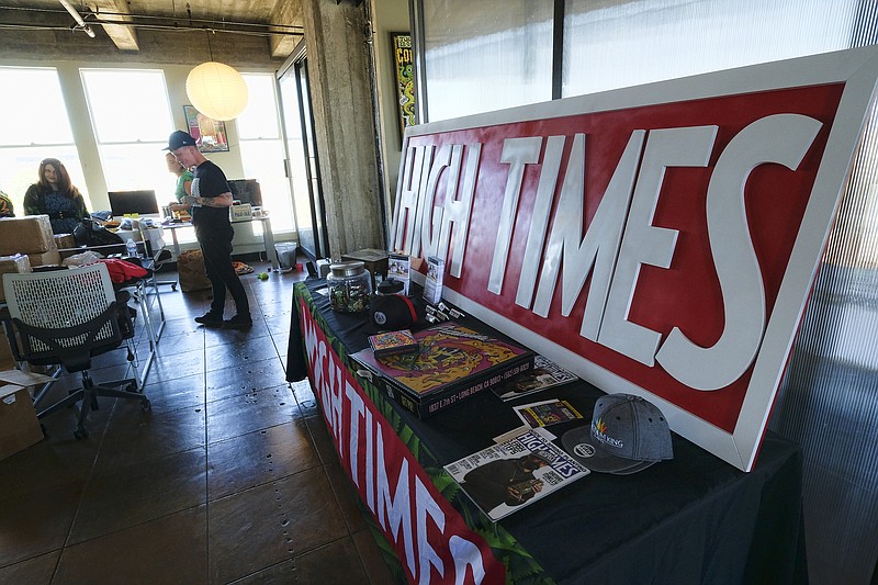 
              FILE - In this Thursday, April 20, 2017, file photo, editorial staff are seen during a meeting in the office of High Times magazine in Los Angeles. High Times, the magazine that for decades has been the go-to bible for backyard pot growers and cocktail party tokers, has been sold to a group of investors that includes reggae musician and ganga guru Damian Marley. What began as a single, somewhat clandestine meeting in an Amsterdam hotel room in 1988 has grown to 11 events last year with more planned for 2017. As many as 25,000 people attended one in Southern California in February. (AP Photo/Richard Vogel, File)
            