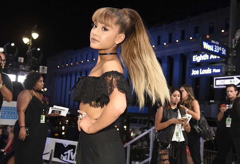 
              FILE - In this Aug. 28, 2016, file photo, Ariana Grande arrives at the MTV Video Music Awards at Madison Square Garden in New York. Grande's mother used a Twitter post on May 29, 2017, to reflect on the bombing of her daughter's May 22, 2017, concert in Manchester, England. (Photo by Chris Pizzello/Invision/AP, File)
            