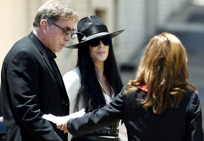 Cher arrives at Snow's Memorial Chapel for the funeral of music legend Gregg Allman Saturday, June 3, 2017, in Macon, Ga. Southern rocker Gregg Allman was laid to rest Saturday near his older brother Duane in the same cemetery where they used to write songs among the tombstones, not far from US Highway 41. (Jason Vorhees/The Macon Telegraph via AP)