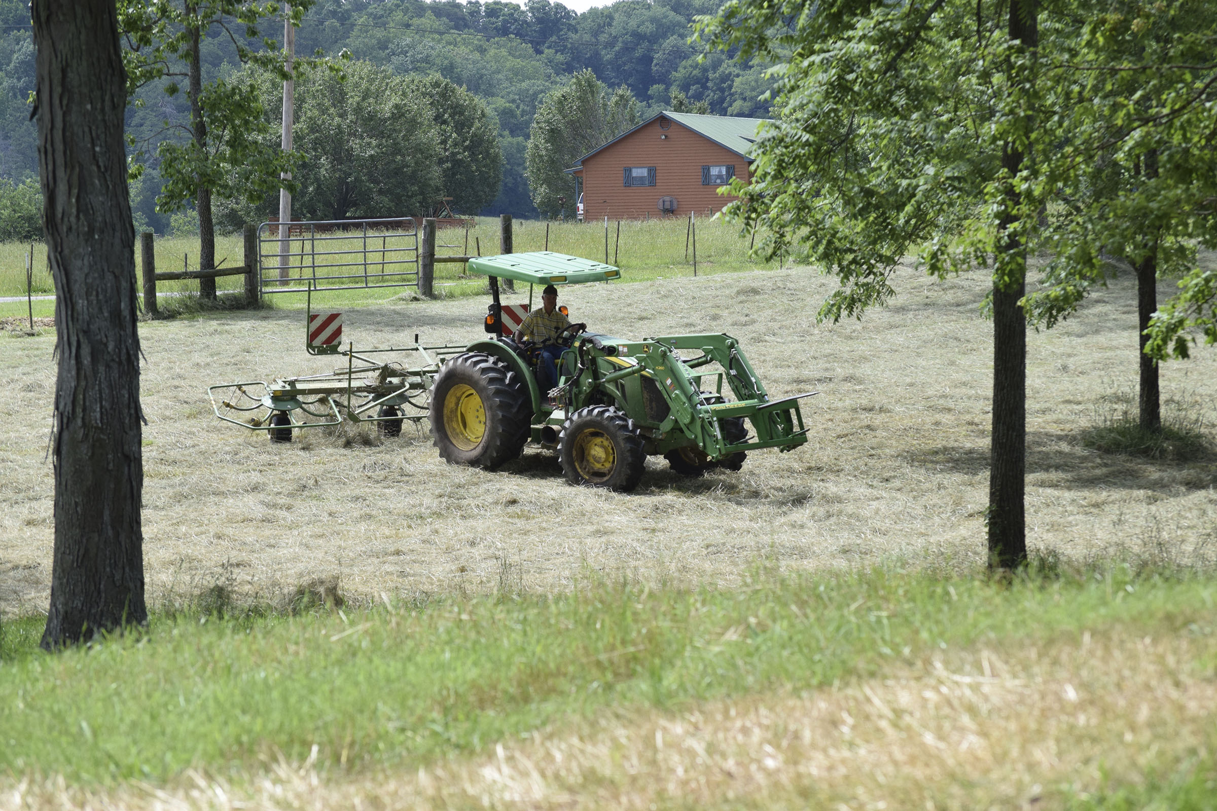 Tommy Cross, of Cross Farms on West Cove Road in southern Walker County, Ga., runs a hay tedder through fresh-cut hay on June 1, 2017, that will feed the Cross family's beef herd and provide backup stock for emergencies. Walker County last year was at the center of an area of extreme drought that persisted throughout 2016 and was finally broken by this year's continuing rain.