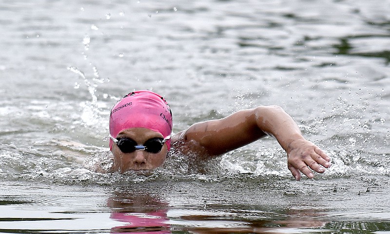 Female winner, Sandra Frimerman-Bergquist of Excelsior, Minnesota, swims to the finish line at Baylor School.  The final day of the 2017 U.S. Masters Swimming Middle and Ultramarathon Distance Open Water National Championships was held on the Tennessee River on June 4, 2017.