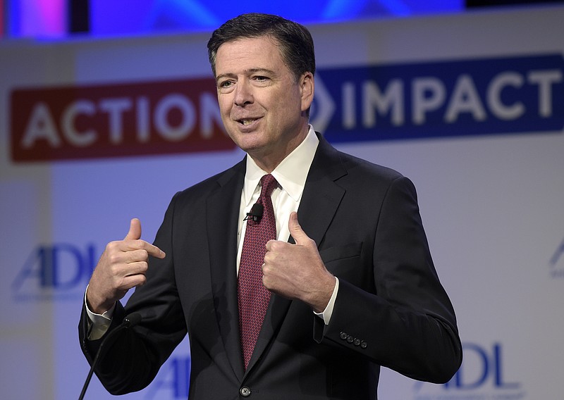 
              In this May 8, 2017, photo, then-FBI Director James Comey speaks to the Anti-Defamation League National Leadership Summit in Washington. Could President Donald Trump keep Comey from testifying to lawmakers about their private conversations? The White House appears to be considering raising the issue of executive privilege, but Trump may have a weak case for claiming that his conversations with Comey should be considered private, especially since the president himself has commented publicly about the circumstances surrounding Comey’s May 9 firing.(AP Photo/Susan Walsh, File)
            