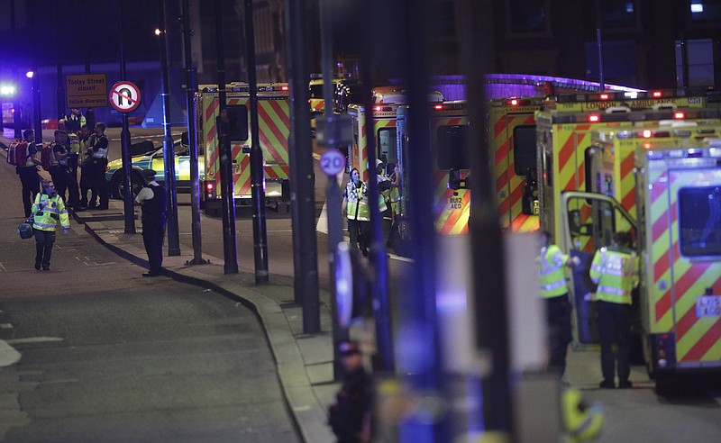 
              Emergency personnel on London Bridge after an incident in central London, Saturday, June 3, 2017.  British police said they were dealing with "incidents" on London Bridge and nearby Borough Market in the heart of the British capital Saturday, as witnesses reported a vehicle veering off the road and hitting several pedestrians. (Dominic Lipinski/PA via AP)
            