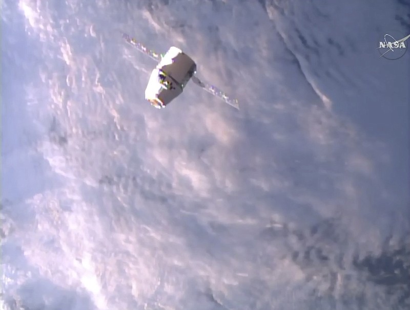 
              A SpaceX Dragon approaches the International Space Station on Monday, June 5, 2017, making an unprecedented second trip to the orbiting outpost. The Dragon supply ship, recycled following a 2014 flight, was launched from Florida on Saturday. (NASA TV via AP)
            