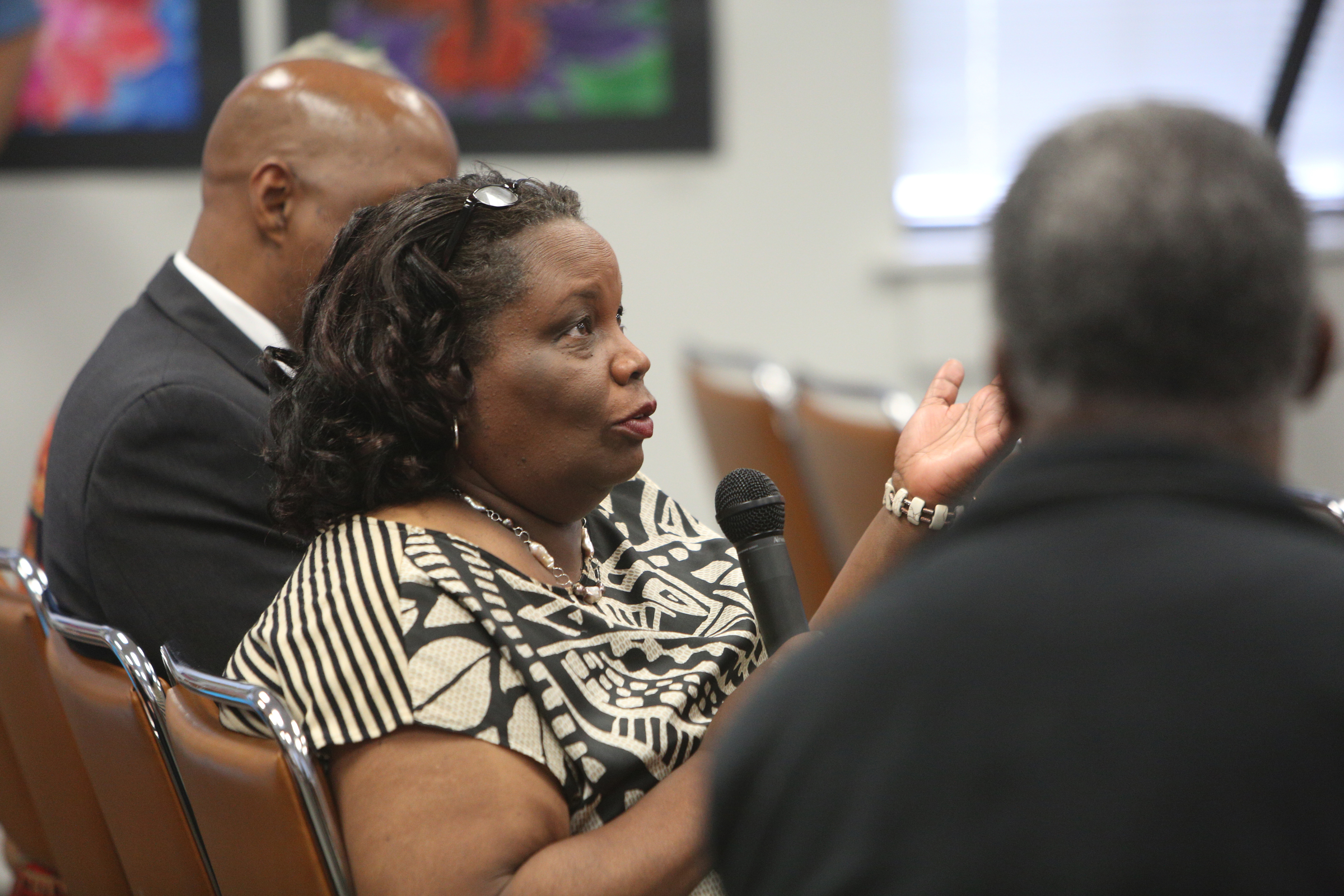 Edna Varner, a coach with Project Inspire, asks a question of Dr. Wayne Johnson, a candidate for Hamilton County Superintendent of Schools, during a meet-and-greet with the public at the Hamilton County Board of Education on Mon., June 5, 2017. Varner served as a principal in several high-need, high-poverty schools in Hamilton County.