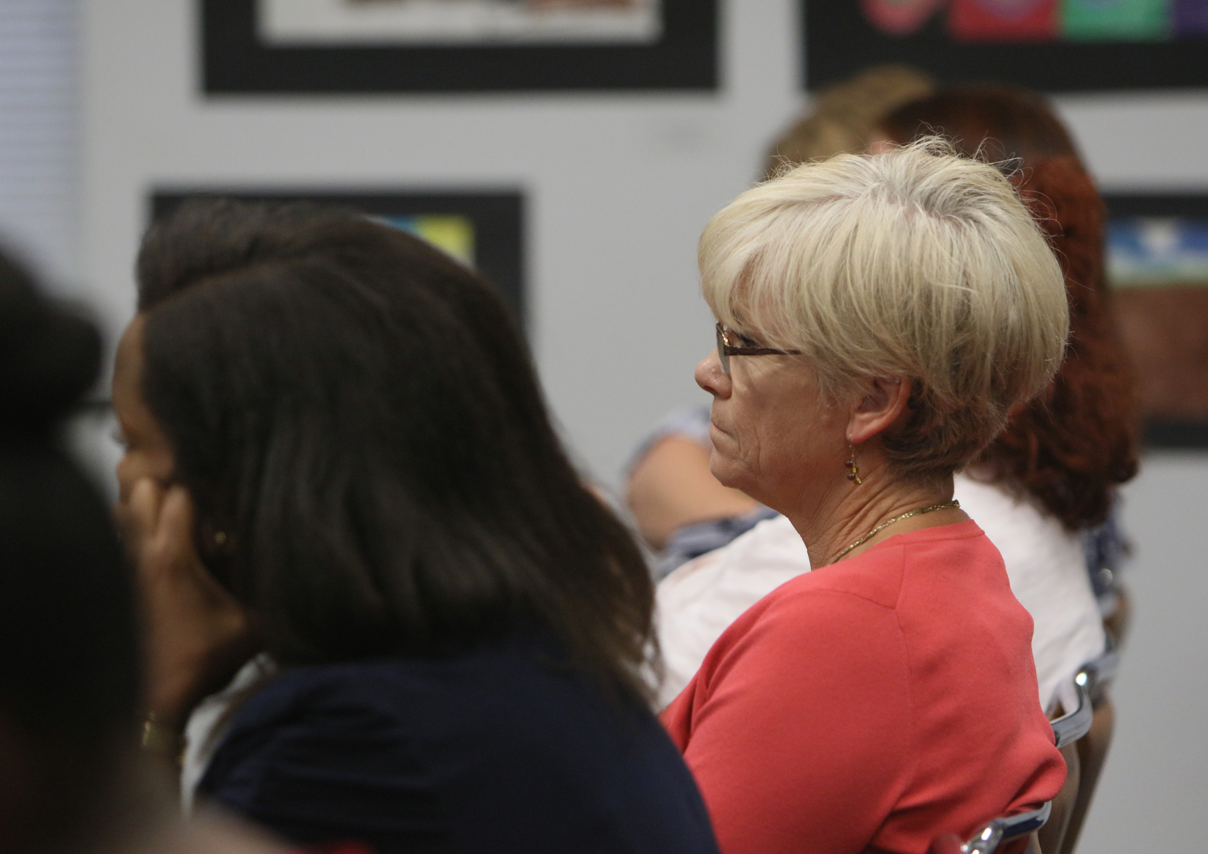 Robin Copp, principal at Ooltewah High School, listens to Dr. Wayne Johnson's interview for the Hamilton County Superintendent of Schools position Mon., June 5, 2017, at the Hamilton County Board of Education. Johnson had a meet-and-greet before his interview Monday night where many concerned citizens showed up to ask questions.