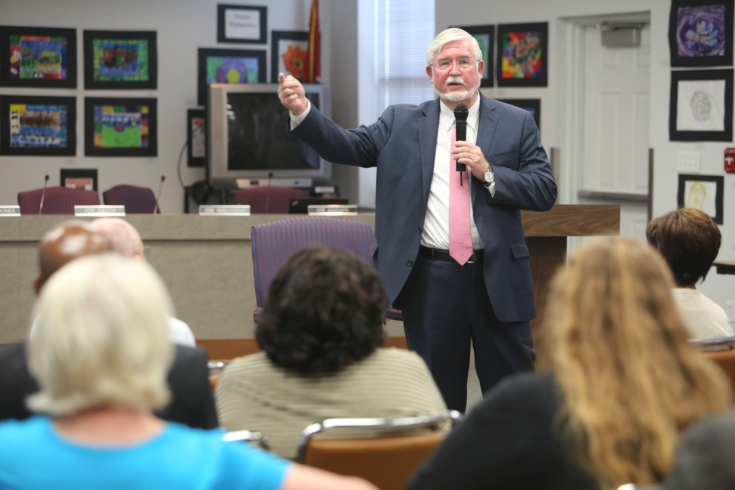 Dr. Wayne Johnson, a candidate for Hamilton County Superintendent of Schools, answers questions of attendees during a meet-and-greet with the public at the Hamilton County Board of Education on Mon., June 5, 2017. Following the event, Johnson was interviewed by the school board.