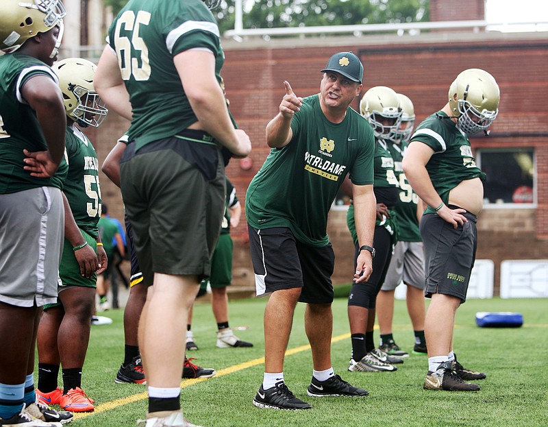 Jeff Jagodzinski works with Notre Dame football players on getting lined up during practice at Finley Stadium in Chattanooga, Tenn., on Mon., June 5, 2017. Notre Dame hired the former coach of Boston College to be their offensive line coach.