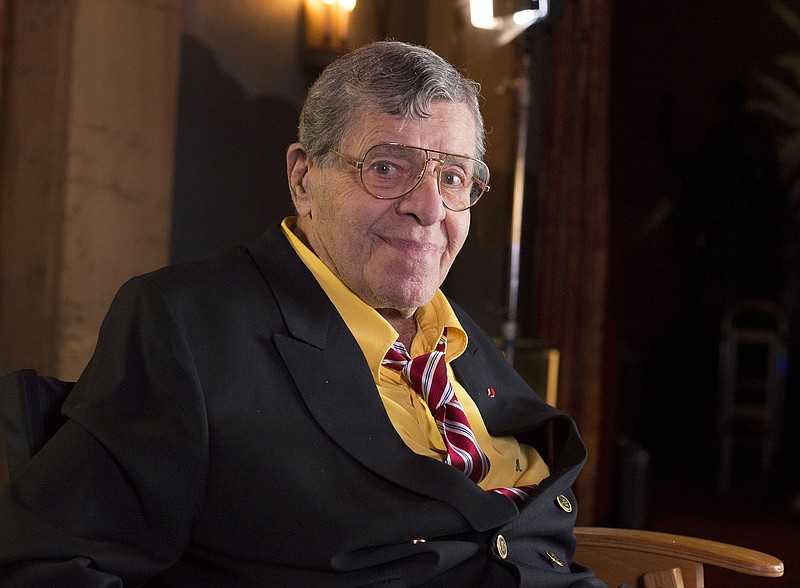 
              FILE - In this April 12, 2014 file photo, actor and comedian Jerry Lewis poses during an interview at TCL Chinese Theatre in Los Angeles.  A publicist for Lewis says the comedian is recovering after being treated at a Las Vegas hospital for a urinary tract infection. The 91-year-old comedian was taken to the hospital on Friday, June 2, 2017, so that he could get antibiotics immediately to treat the condition. Publicist Candi Cazau says he is doing fine and is expected to be released shortly. (Photo by Dan Steinberg/Invision/AP, File)
            