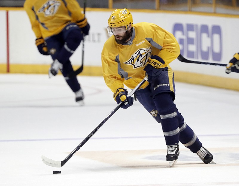 
              Nashville Predators center and captain Mike Fisher skates during practice Friday, June 2, 2017, in Nashville, Tenn. The Predators are scheduled to face the Pittsburgh Penguins in Game 3 of the NHL hockey Stanley Cup Finals Saturday. (AP Photo/Mark Humphrey)
            