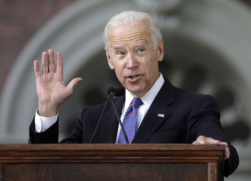 
              FILE - In this May 24, 2017, file photo, former Vice President Joe Biden delivers the annual Harvard College Class Day address on the campus of Harvard University, in Cambridge, Mass. Just days after launching a new political action committee, former Biden will join Republican officials and donors at a weekend retreat hosted by former GOP presidential nominee Mitt Romney. (AP Photo/Steven Senne, File)
            
