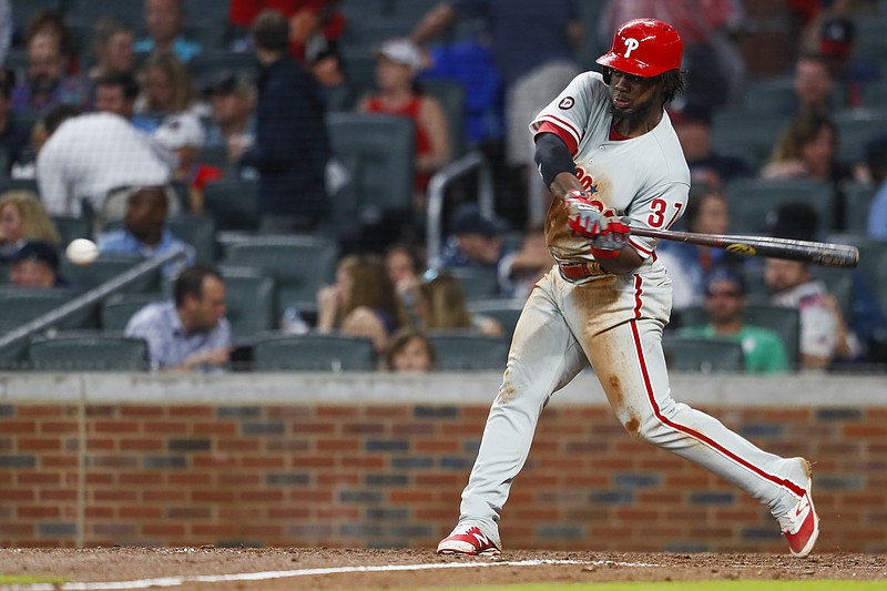 Philadelphia Phillies Odubel Herrera (37) hits a 2 run homerun in the fourth inning of a baseball game against the Atlanta Braves, Monday, June 5, 2017, in Atlanta. (AP Photo/Todd Kirkland)