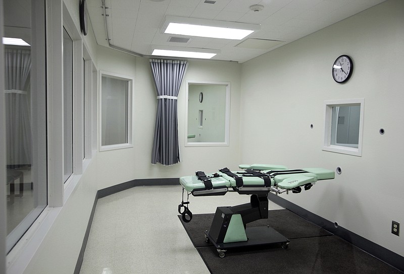 
              FILE - This Sept. 21, 2010 file photo shows the interior of the lethal injection facility at San Quentin State Prison in San Quentin, Calif. The California Supreme Court heard arguments over whether to block a voter-approved measure to speed up executions at a hearing in Los Angeles Tuesday, June 6, 2017. The case was brought by death penalty foes after voters approved Proposition 66 in November. (AP Photo/Eric Risberg, File)
            