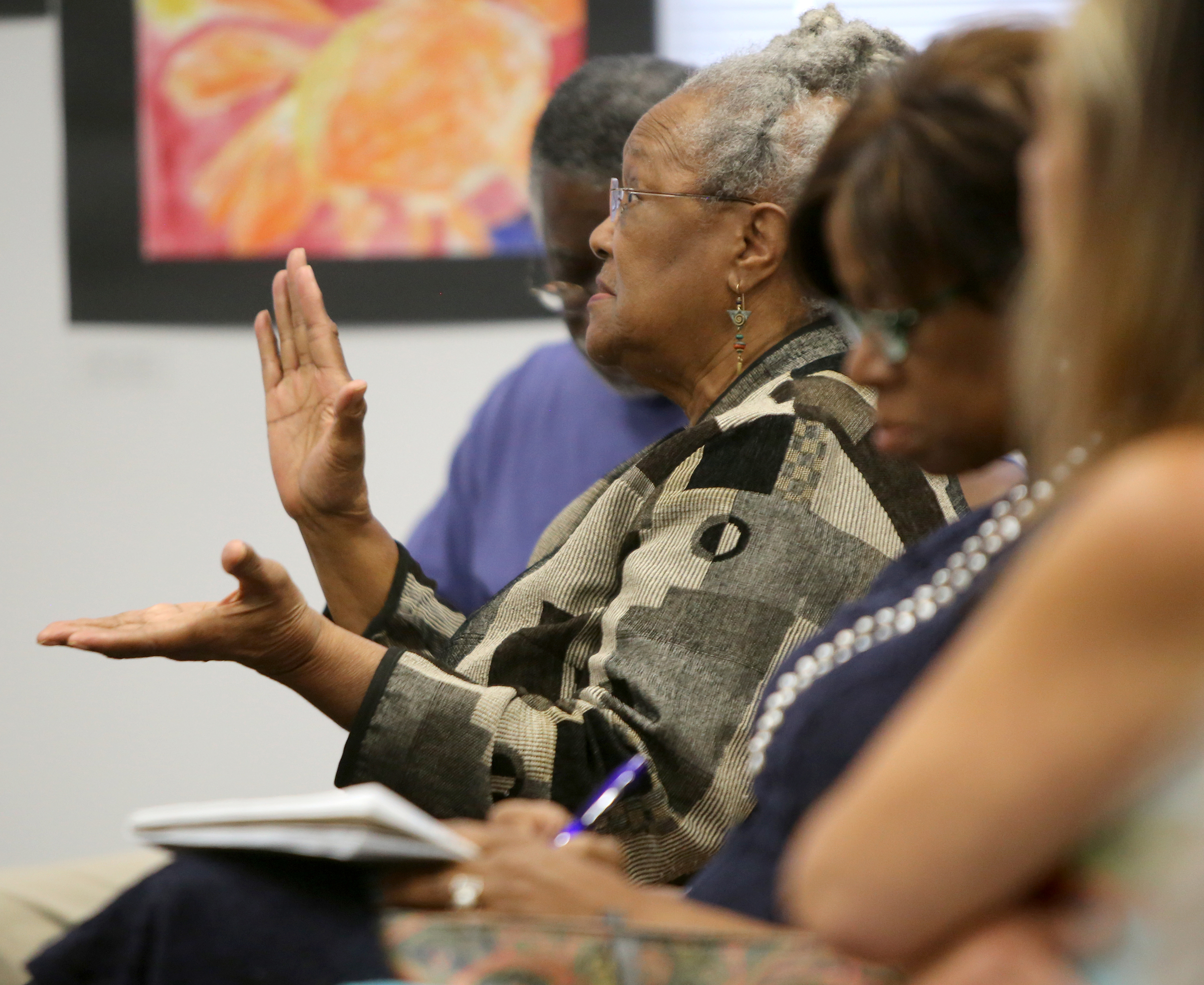 Dr. Everlena Holmes addresses superintendent candidate Stuart Greenberg during a public meet-and-greet at Hamilton County Schools' central office on Tuesday, June 6, in Chattanooga, Tenn. Greenberg, an educator for 35 years, is one of five finalists for the superintendent position.