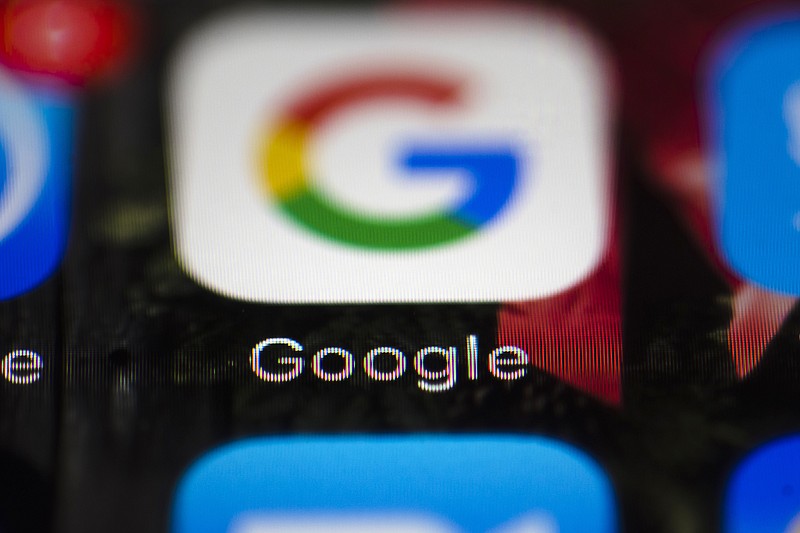 
              FILE- This April 26, 2017, file photo shows a Google icon on a mobile phone in Philadelphia. Google is spearheading an educational campaign to teach pre-teen children how to protect themselves from scams, predators and other trouble. The program announced Tuesday, June 6, is called “Be Internet Aware.” (AP Photo/Matt Rourke, File)
            