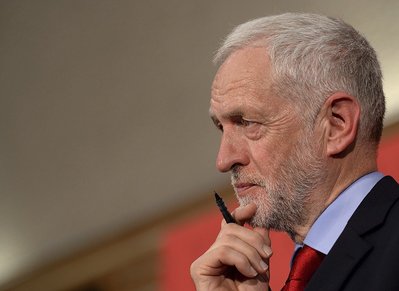 
              FILE - In this Thursday June 1, 2017 file photo, Britain's Labour Party leader Jeremy Corbyn, looks on during a speech on Brexit while on the General Election campaign trail in Basildon, England. No one was more surprised than Jeremy Corbyn when he was elected leader of Britain’s Labour Party. Now, the bearded 68-year-old politician is trying to overcome skepticism about his leadership to become Britain’s next prime minister in the June 8 general election. But many Labour lawmakers are uncomfortable following a man who has often rebelled against the party leadership during his three decades on the backbenches. (Stefan Rousseau/PA via AP, file)
            