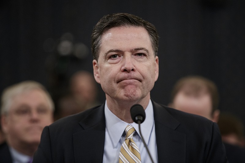 
              In this March 20, 2017 photo, FBI Director James Comey pauses as he testifies on Capitol Hill in Washington, before the House Intelligence Committee hearing on allegations of Russian interference in the 2016 U.S. presidential election.  Comey’s appearance Thursday before the Senate intelligence committee is one of the most anticipated congressional hearings in years.  (AP Photo/J. Scott Applewhite)
            