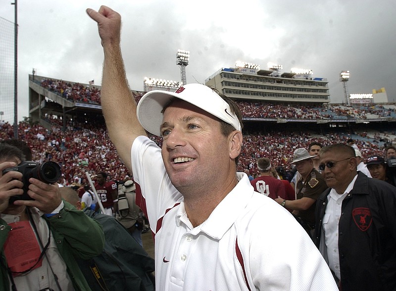 
              FILE - In this Oct. 9, 2004, file photo, Oklahoma coach Bob Stoops celebrates the Sooners 12-0 win over Texas, in Dallas. Stoops has decided to retire as Oklahoma’s football coach after 18 seasons that included the 2000 national championship and 10 Big 12 Conference titles.
(AP Photo/Tony Gutierrez, File)
            