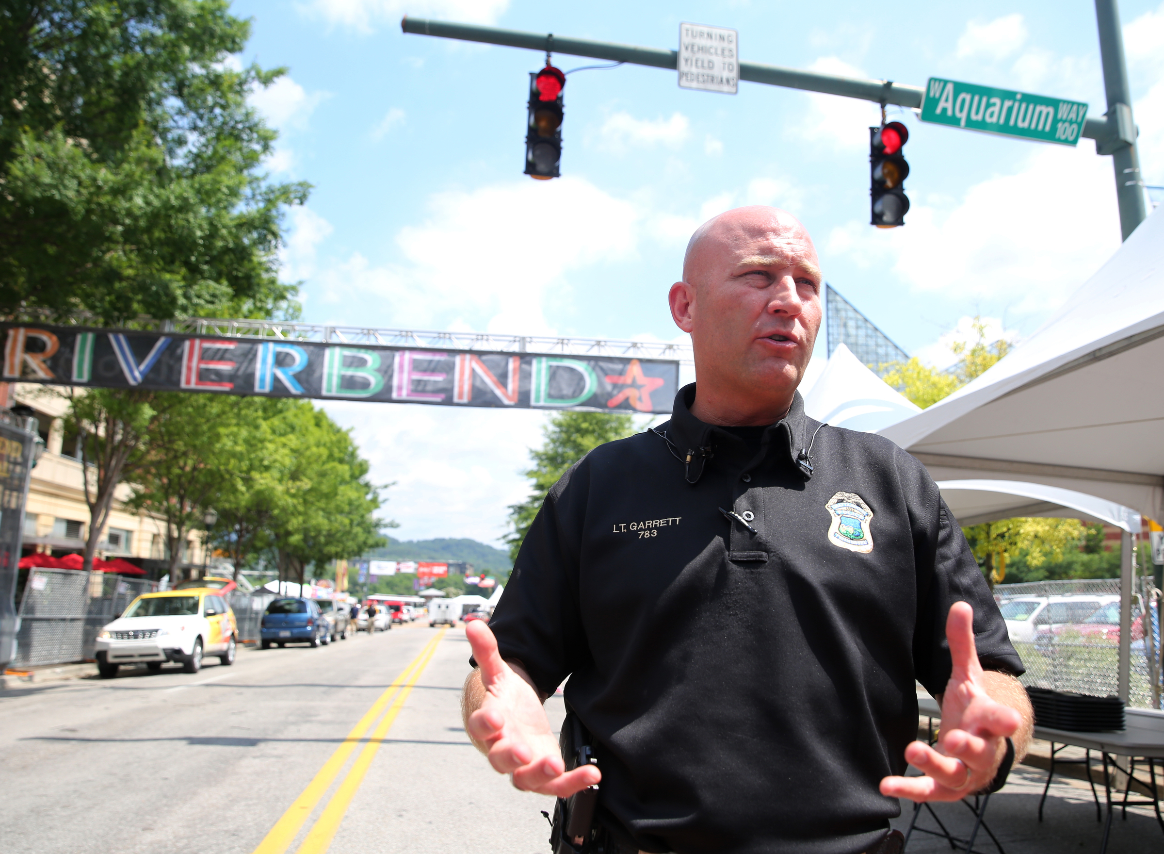 Chattanooga police Lt. Austin Garrett talks about security measures being take this year for the Riverbend Festival during a press conference at the entrance for the Riverbend Festival on Chestnut Street at Aquarium Way in Chattanooga, Tenn., on Thursday, June 8, 2017. Garrett has worked the annual music festival for 18 years and served as the lead officer since 2009.