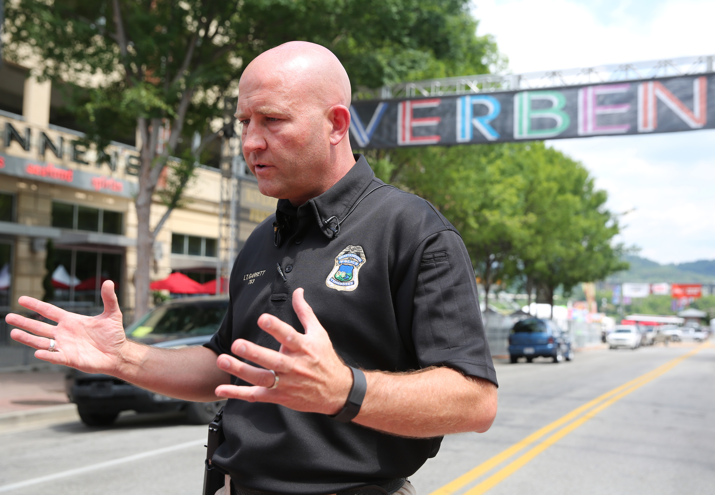 Chattanooga police Lt. Austin Garrett talks about security measures being take this year for the Riverbend Festival during a press conference at the entrance for the Riverbend Festival on Chestnut Street at Aquarium Way in Chattanooga, Tenn., on Thursday, June 8, 2017. Before attendees get to the waterfront, theyլl have to pass bag checks conducted by festival volunteers, private security workers and officers in uniform.