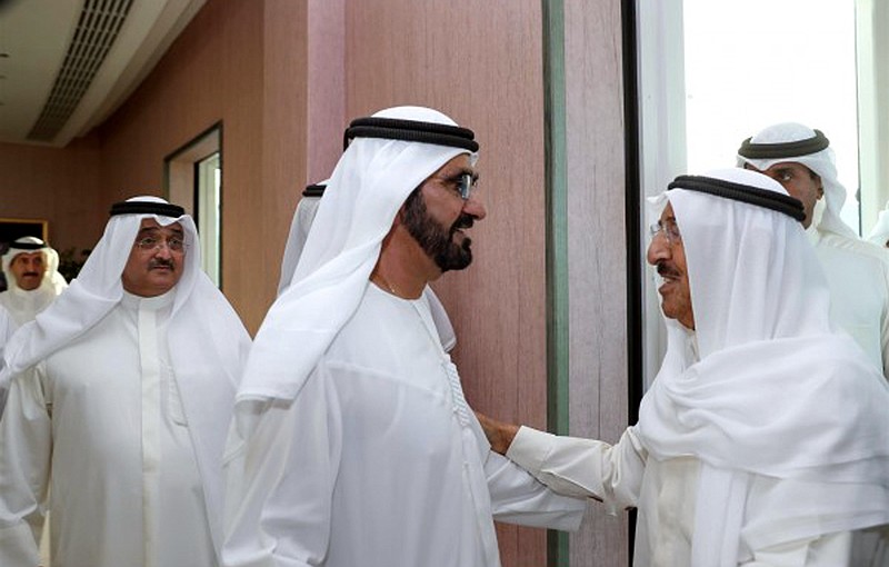 
              In this photo released by Emirates News Agency, WAM, the Emir of Kuwait, Sheikh Sabah Al-Ahmad Al-Jaber Al-Sabah, right, is received by UAE Vice President, Prime Minister and Ruler of Dubai, Sheikh Mohammed bin Rashid Al Maktoum, to hold talks about Qatar, in Dubai, United Arab Emirates, Wednesday, June 7, 2017. Saudi Arabia and three other Arab states cut ties with Qatar on Monday, accusing it of supporting violent Islamist groups across the region. (WAM via AP)
            