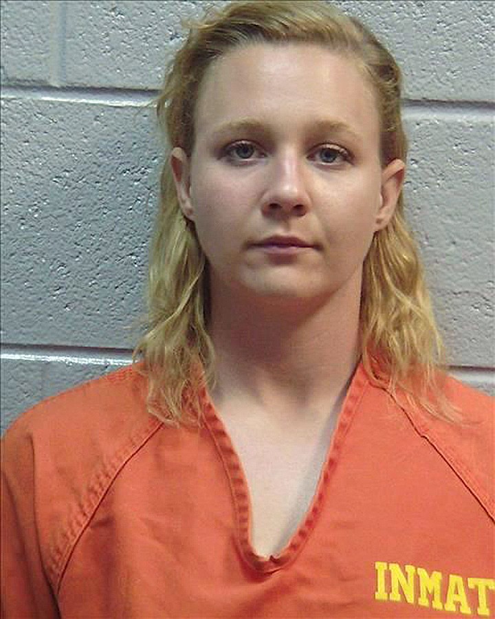 
              This June 2017 photo released by the Lincoln County (Ga.) Sheriff's Office, shows Reality Winner. Winner, is being held for federal authorities at the Lincoln County, Ga., jail. Winner charged with leaking U.S. government secrets to a reporter poses no flight risk if she's released from pre-trial confinement, her parents said Wednesday, June 7, 2017, though they fear prosecutors will seek to use the case to send a tough message from the Trump administration. (Lincoln County (Ga.) Sheriff's Office via AP)
            